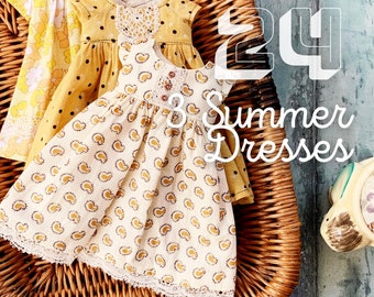 May include: Three yellow and white patterned doll dresses with lace trim, arranged in a wicker basket. The text "24" and "3 Summer Dresses" is visible in the image.