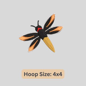 May include: Embroidered design of a black and orange dragonfly with a yellow tail. The design is suitable for a 4x4 inch embroidery hoop. "Hoop Size: 4x4" is written below the design.