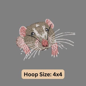 May include: Embroidered design of a brown and pink rat with white whiskers. The rat is looking directly at the viewer. The design is for a 4x4 hoop.