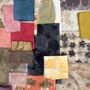 May include: A collection of fabric swatches featuring botanical eco-prints and natural dyes. The assortment includes various textures and colours such as deep blue, mustard yellow, soft pink, terracotta, and earthy brown, all decorated with leaf patterns.