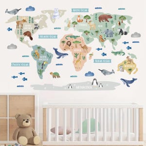 May include: A colorful world map wall decal with animal illustrations for each continent. The map features a blue whale, a giraffe, a penguin, a kangaroo, a polar bear, a lion, a toucan, a turtle, a narwhal, a camel, an elephant, a bear, a fox, a deer, a beaver, a raccoon, a crocodile, and a koala.