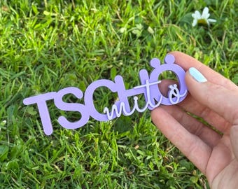 Bye with the lettering "Tschö"