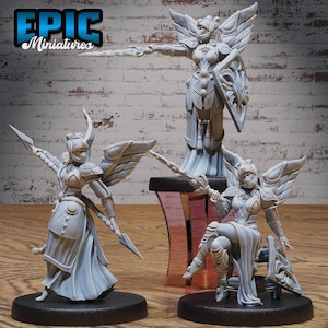 May include: Three unpainted miniature figurines of winged warriors. Each figure is wearing armour and holding a weapon. The figures are posed in different stances. The figures are made of a white plastic material.