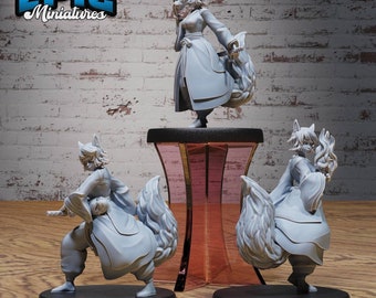 May include: Three gray painted figurines of a fox-like creature with a long, bushy tail. The creature is wearing a long robe and has a human-like face. The figurines are posed in different positions, one standing on a pink pedestal.
