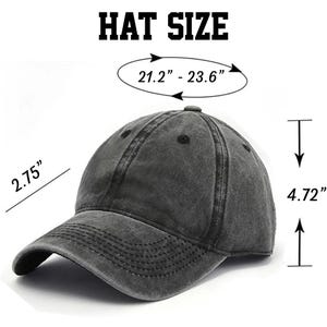 May include: A gray, washed cotton baseball cap with a curved brim. The hat size is 21.2 inches to 23.6 inches. The hat is 4.72 inches tall and 2.75 inches wide.