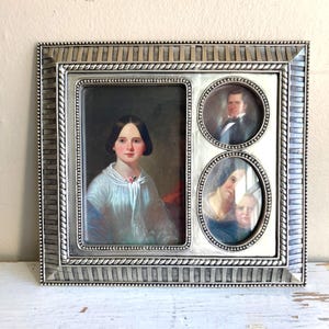 Tinnen fotolijst in regentijdstijl met 3 fotovakken