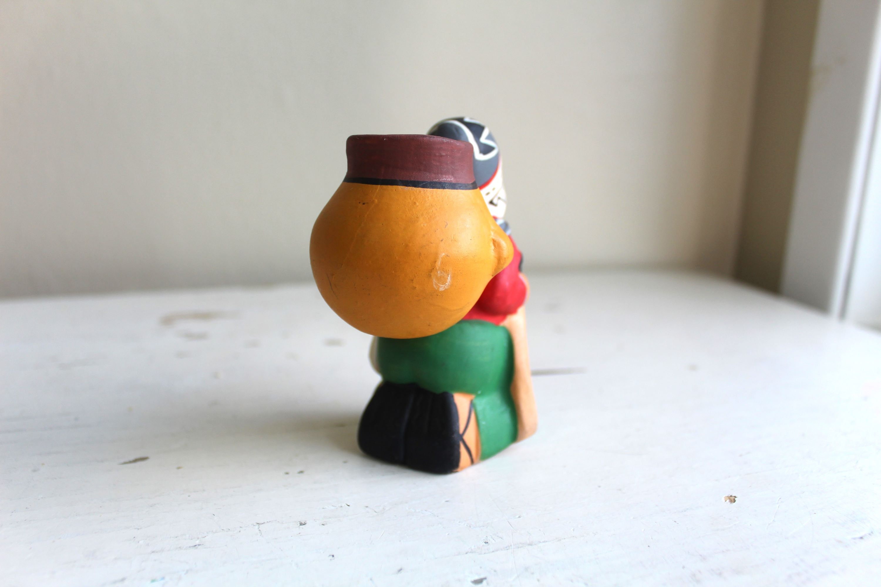 ペルーの鉱夫のキャンドルホルダー：手描きの陶器のお土産 - Etsy 日本
