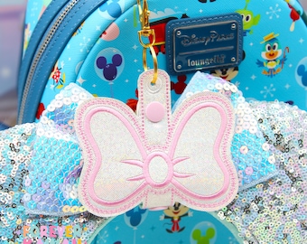 Portachiavi con orecchie a fiocco ispirato a Marie Cat / Porta orecchie e cappello Disney in ecopelle olografica bianca e rosa / Secchiello per popcorn, tazza da resort