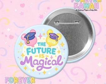 May include: A light blue button with the text "THE FUTURE IS Magical" in a whimsical font. The button features two cartoon mouse heads wearing graduation caps, one pink and one yellow, with the year 2026. The background is a pastel pink with stars and the text "FOREVER KAWAII".