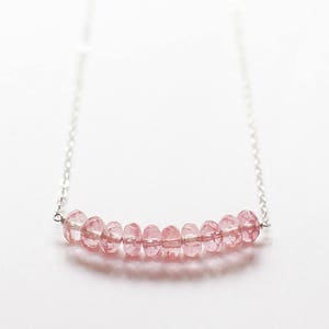 heron in rose - faceted gemstone necklace