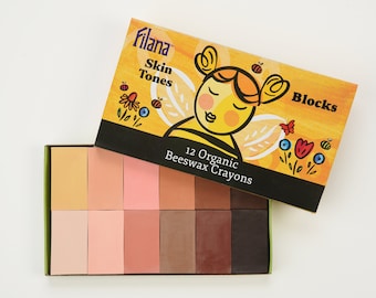 May include: A box of 12 organic beeswax crayons in skin tones. The box is yellow with a cartoon bee and the text "Filana Skin Tones Blocks 12 Organic Beeswax Crayons".