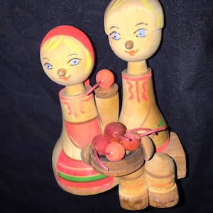Old Wood Hand-Painted Dolls image 1