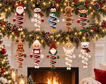 May include: A collection of ten crocheted Christmas ornaments featuring various characters including Santa, a snowman, a penguin, a gingerbread person, an elf, a reindeer, Mrs. Claus, a gnome, an angel, and a polar bear, each with a spiral body.