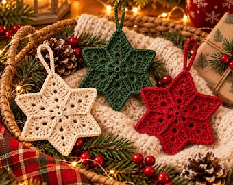 May include: Three six-pointed star ornaments crafted from crochet thread in cream, dark green, and red. Each star features a central circular ring, intricate openwork patterns, and a small loop at the top for hanging, arranged on a textured surface.
