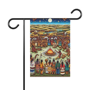 May include: A colorful garden flag depicting a gathering of Native American people around a campfire under a starry night sky. The flag features a vibrant scene with detailed illustrations of people in traditional clothing, a fire, and a moon.