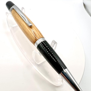 Gatsby twist pen with chrome fittings and Jack Daniels whiskey barrel oak wood.