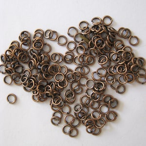 50 Vintage Tiny 4mm Jump Rings