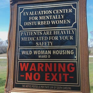 Disturbed Woman Sign for Insane Women ' Evaluation Center for Disturbed Women Sign