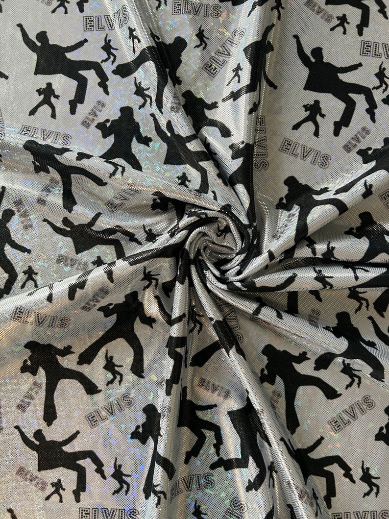 May include: Silver fabric with a repeating pattern of black silhouettes of Elvis Presley singing and the word "Elvis" printed in white.