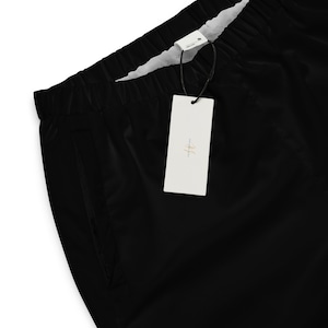 Black Unisex Track Pants, Black Track Pants, Relaxed Fit Track Pants, Unisex Track Pants, Mesh Lining, Water-Resistant.