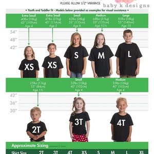 May include: A size chart for toddler and youth t-shirts, with measurements in inches and pounds. The chart includes sizes from 2T to XL, with corresponding body length and chest width measurements. The chart also shows example ages and heights.