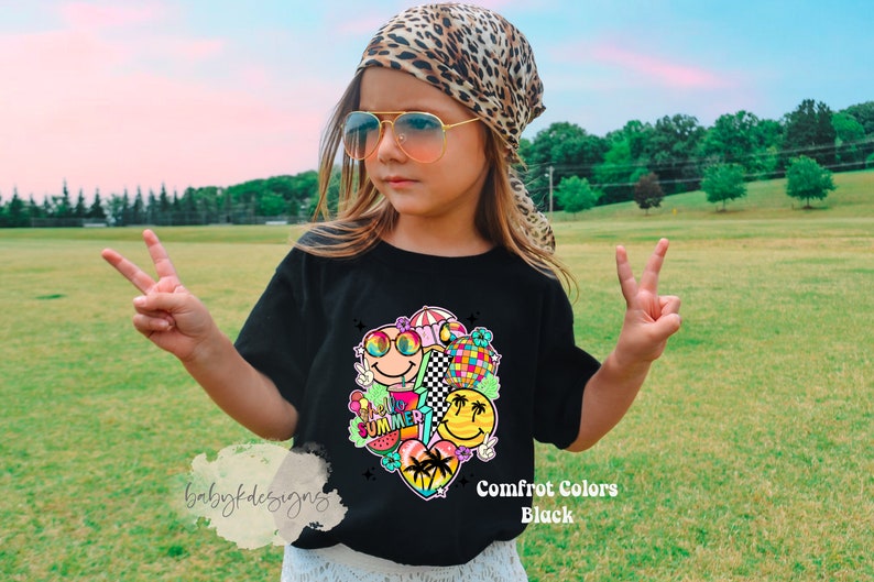 May include: Black t-shirt with a vibrant summer graphic, including smiley faces, a disco ball, and palm trees. The word "SUMMER" is part of the design. The shirt is labelled "Comfort Colors Black".