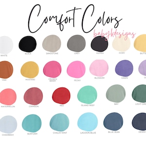 May include: A color chart showing 24 different colors of Comfort Colors apparel. The colors are arranged in three rows of eight colors each. The colors include white, black, sandstone, grey, pepper, ivory, butter, yam, mustard, crunch berry, peony, blossom, grape, orchid, watermelon, crimson, red, island reef, bay, light green, chambray, seafoam, chalky mint, lagoon blue, blue jean, and denim.