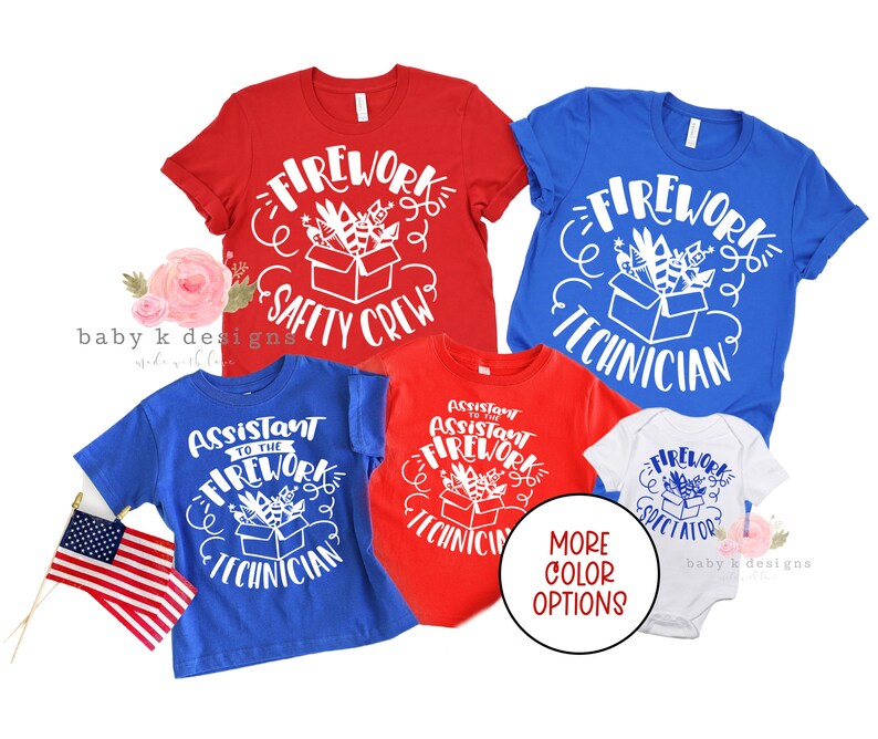 May include: Several red, blue, and white t-shirts and a baby onesie with firework-themed graphics. The shirts display phrases such as "Firework Safety Crew" and "Assistant to the Firework Technician". An American flag is also visible.