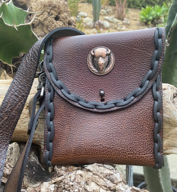 Brown crossbody leather bandolier cell phone case/carrier/pouch/bag with copper Buffalo head Concho Brown crossbody leather bandolier cell phone case/carrier/pouch/bag with copper Buffalo head Concho