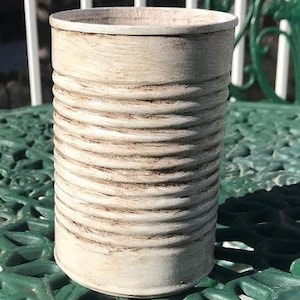 Painted, antiqued and distressed  tin can