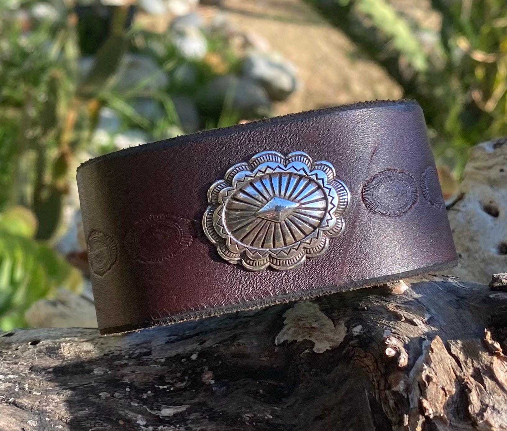 Brown handmade leather cuff bracelet with southwestern silverplated metal concho