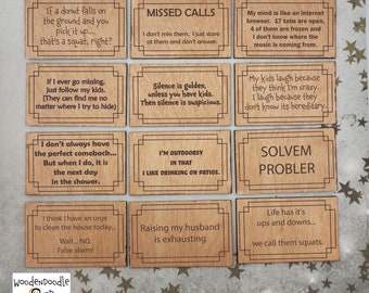 May include: A set of 10 wooden coasters with funny sayings about life, family, and everyday situations. The coasters are laser cut and engraved with a light brown wood finish.