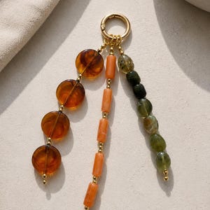 Earth Tone Beaded Bag Charm | Handmade Boho Purse Charm | Amber Green Keychain | Gold Handbag Accessory | Aesthetic Bag Charm | Gift for Her image 1