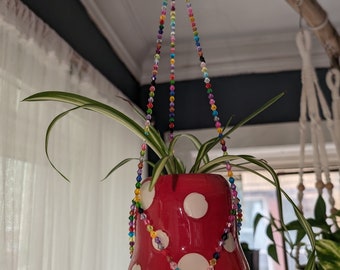 Soporte para plantas de macramé con cuentas