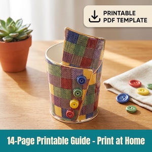 May include: A ceramic mug featuring a colourful plaid pattern in shades of red, blue, yellow, and green. The exterior is decorated with four raised, circular buttons in blue, green, yellow, and red. The text PRINTABLE PDF TEMPLATE is visible.