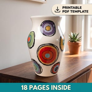 May include: A white ceramic vase featuring hand-painted, multi-colored concentric circles in red, purple, green, yellow, and blue, outlined with black scribbled lines. The vase has a wide, flared rim and a rounded body. Includes a printable PDF template.