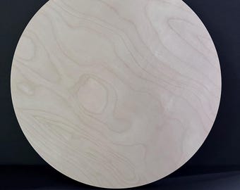 wood rounds laser cut from 1/2" birch plywood. These 15-inch rounds are perfect for all your crafting needs.