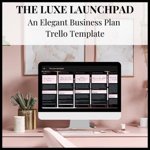 Op de afbeelding: Een computerscherm met een Trello-sjabloon met de titel "The Luxe Launchpad: Een elegant businessplan Trello-sjabloon". Het sjabloon is verdeeld in vijf secties, elk met een andere titel: "Hay There Brand", "The Heart of Business", "Push Your Brand", "Shine Bright" en "Build Empire".