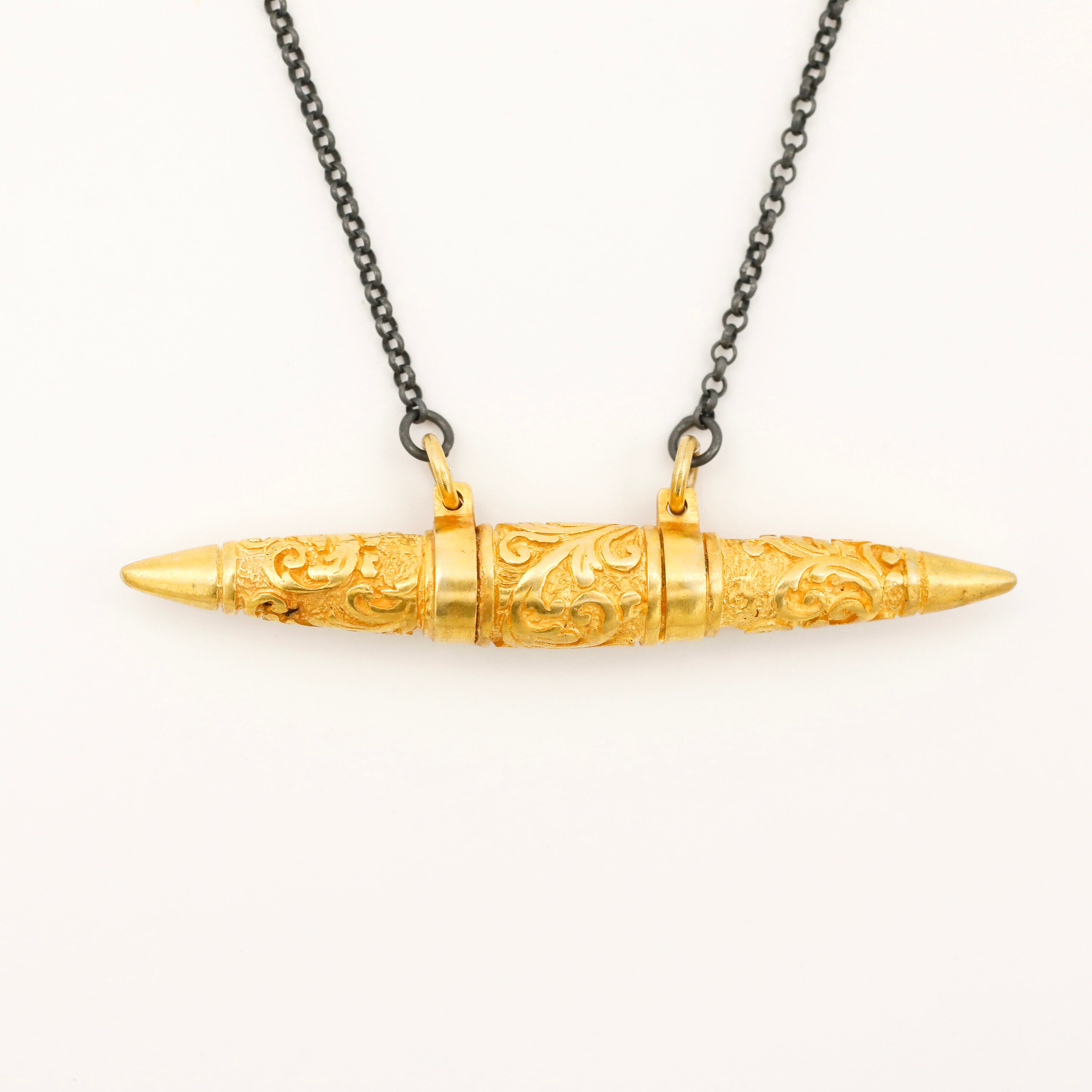 Bullet pendant meaning deals