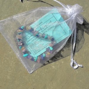All orders arrive packaged in an organza bag with one of our Elra information cards, detailing the properties and crystals included with your handmade jewellery.