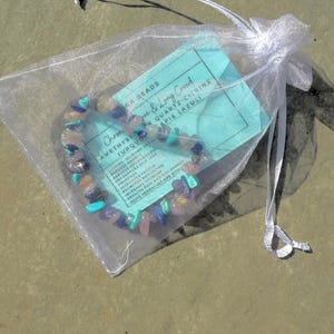 All orders arrive packaged in an organza bag with one of our Elra information cards, detailing the properties and crystals included with your handmade jewellery.