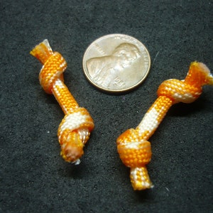 Two Orange and White Miniature Rope Knot Dog Toys for Doll House in 1/12 Scale Dollhouse