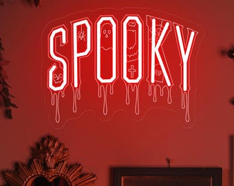 May include: A red neon sign that reads "SPOOKY" hangs on a wall, dripping with a spooky design. The wall is decorated with a heart-shaped mirror, framed artwork, candles, and hanging decorations, creating a Halloween theme.