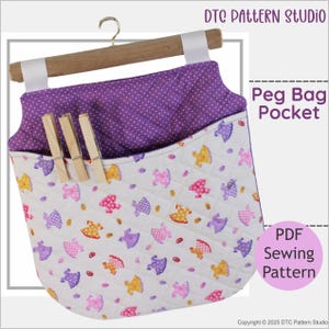May include: A purple and white fabric peg bag with a pocket. The bag has a hanger and is decorated with a pattern of little dresses. The text "Peg Bag Pocket" and "PDF Sewing Pattern" is visible on the image.