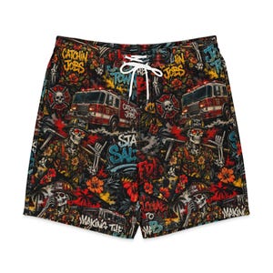 May include: Black swim trunks with a vibrant, detailed print. The design features fire trucks, skeleton firefighters, and graffiti-style text including "Catchin' Jobs" and "Stay Salty". The trunks have a white drawstring.