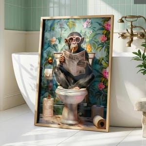 May include: A framed wall art print featuring a chimpanzee wearing pink glasses and smoking a cigar while sitting on a toilet reading a newspaper titled The Daily Flush, set against a vibrant background of green leaves and pink flowers.