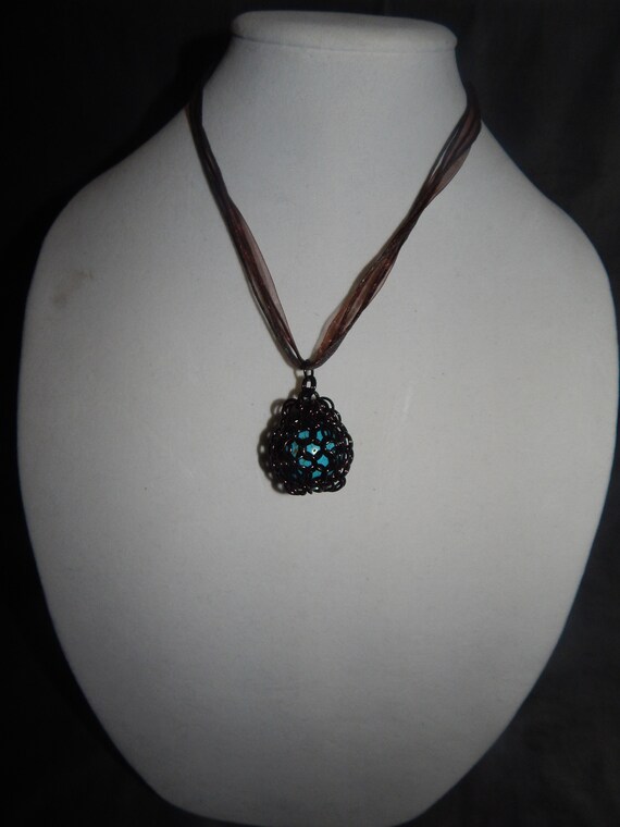 Turquoise Bead in Brown Anodized Aluminum o-rings Necklace