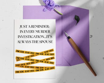 May include: A white card with black text that reads "JUST A REMINDER: IN EVERY MURDER INVESTIGATION...IT'S ALWAYS THE SPOUSE". The card is decorated with yellow and black crime scene tape that reads "CRIME SCENE - DO NOT CROSS".