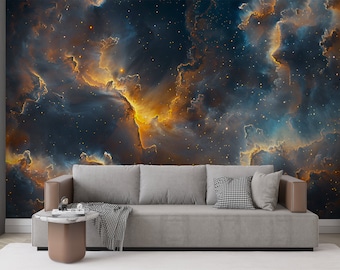 May include: A gray couch with a throw blanket and pillows in front of a wall mural depicting a nebula with swirling clouds of orange, blue, and white against a dark blue background.