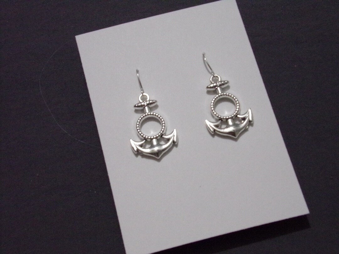 Small Anchor and Wheel Nautical Stud Earrings in Silver | DOTOLY